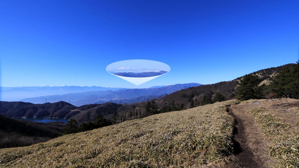 遠くに北アルプスが見える風景